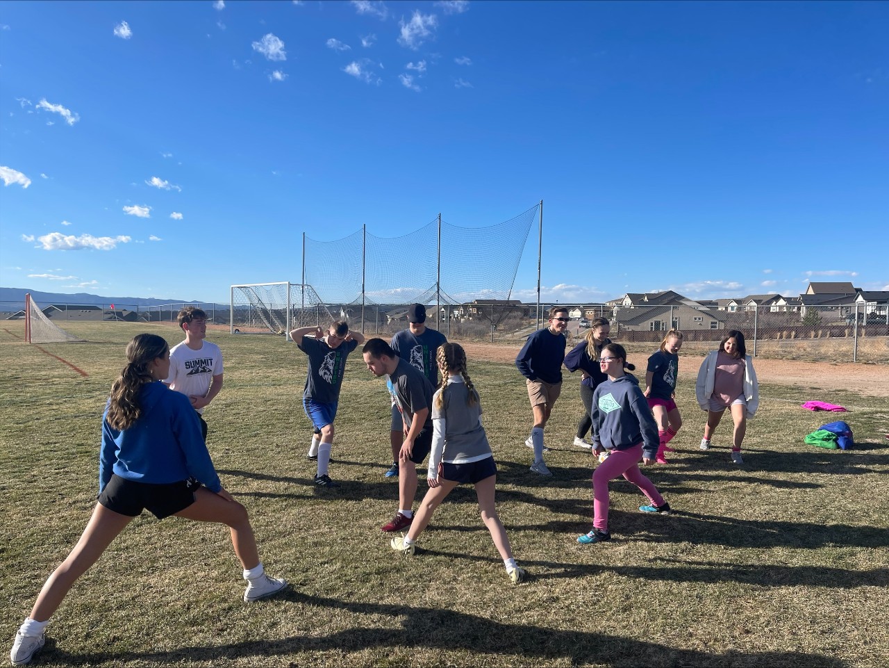 Students playing soccer